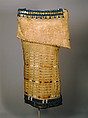 Woman’s Side-Fold Dress, Native-tanned leather, porcupine and bird quills, brass buttons, cowrie shells, glass beads, metal cones, horsehair, plant fiber, woven cotton tape, wool cloth, Probably Lakota or Cheyenne